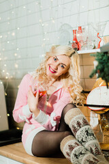 Young housewife preparing christmas dinner in kitchen