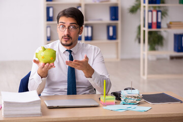 Young male bookkeeper in pension concept