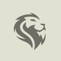 Majestic male Lion face icon symbol. Premium wild African cat animal head vector illustration. © JoelMasson