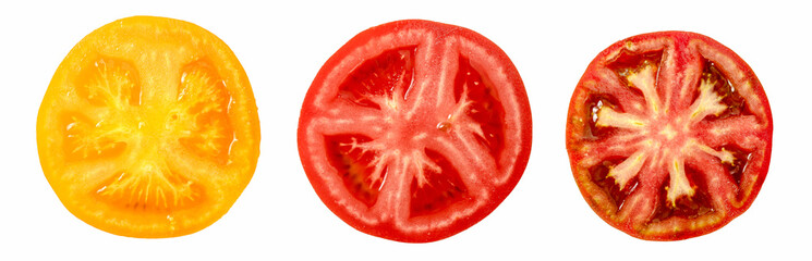 Sliced tomatoes isolated. Slices of different varieties of tomatoes on white background. Red tomato, yellow orange tomato and kumato tomato.