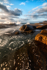 a body of water with along the coastline