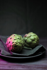 Still life close-up of artichokes. Culinary and gastronomic photography of vegetables. rustic style