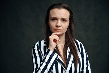 Caucasian business woman serious thinking on black background
