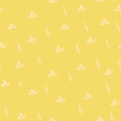 Seamless pattern with prints of leaves on a trendy yellow background. Grunge leaf print. Printing on fabric, wallpaper, packaging, stamp or leaf print