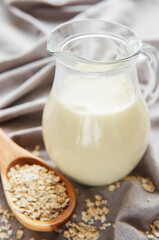 Obraz na płótnie Canvas Vegan oat milk, non dairy alternative milk