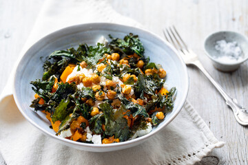 Vegetarian salad of roast butternut squash, crispy kale and chickpeas