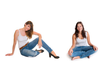 Fototapeta na wymiar Portraits of two happy young women wearing blue jeans and summer tops, isolated on white studio background
