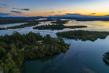 Fototapeta premium Sunset over the bay and rivers