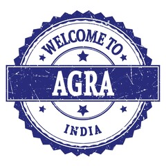 WELCOME TO AGRA - INDIA, words written on blue stamp