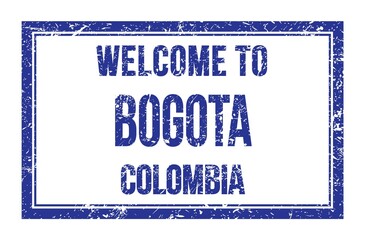 WELCOME TO BOGOTA - COLOMBIA, words written on blue rectangle stamp