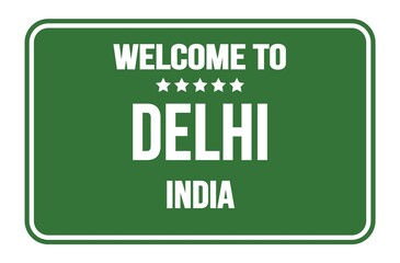 WELCOME TO DELHI - INDIA, words written on green street sign stamp