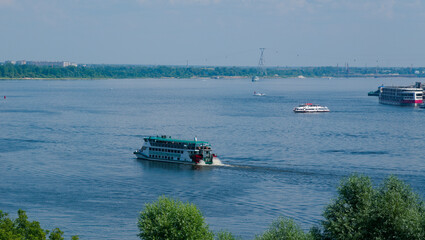 River navigation. Port on the river. Motor ship on wheels