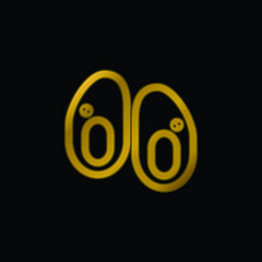 Baby Shoes gold plated metalic icon or logo vector