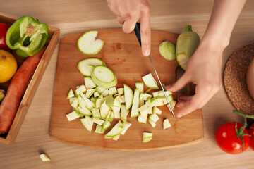 cutting vegetables healthy eating kitchen homework