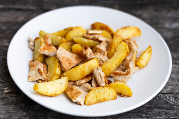 Pan-fried chicken and potatoes