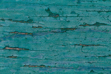 close up of painted in turquoise wooden board