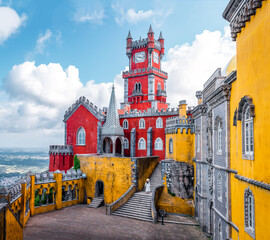 Traveler woman visiting Pena Palace in Sintra, Lisbon, Portugal. Famous landmark. The most...