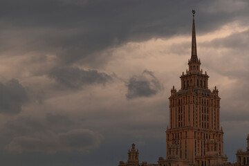 The Hotel Ukraina against a sky in summer evening