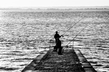 Fishermen in La Marechale harbor.  Saint-Seurin-de-Cadourne village