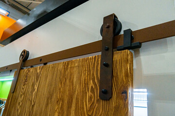 Accessories of sliding system in LOFT style. Sliding system for hanging doors