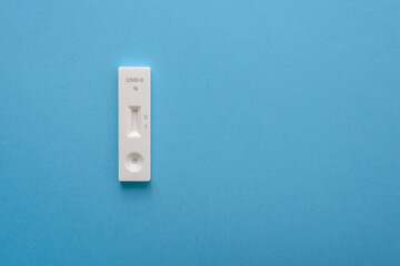 Covid19 antigen test kit with cassette, pipette and plastic bottle for saliva