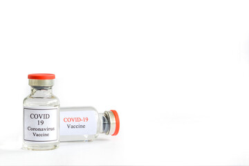 Vaccine bottle for immunization from coronavirus covid 19 epidemic on lab table with copy space, Concept with vaccine vial for Coronavirus, Sars, Covid 19 virus.
