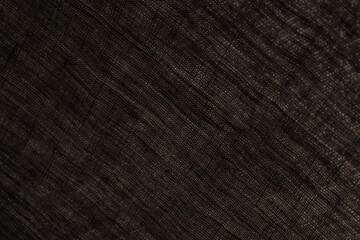abstract rough dark background linen natural fabric, short focus