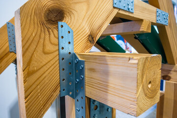 Metal connection systems for wooden products