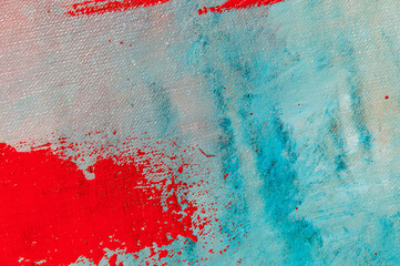 abstract creative background: red blurred stains of colored primer when toning the canvas, temporary object.