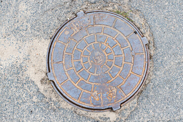 manhole cover in the street
