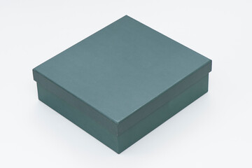 Green box and cover on the white background.