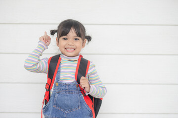 Portrait of happy little Asian child  on white background