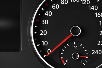 Speedometer on modern car dashboard, closeup view