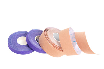 Set of different size lifting or kineio tape rolls on white background