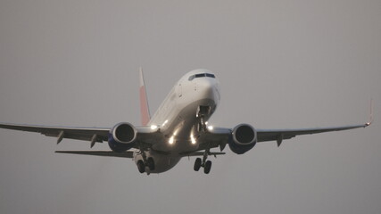 Jet plane departure on a snowy runway