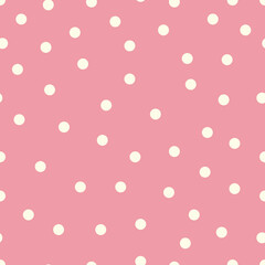 Baby pink polka dot seamless pattern background. Classic and trendy white dots on baby pink background. Perfect for fabric and wallpaper. © Izzat Ali