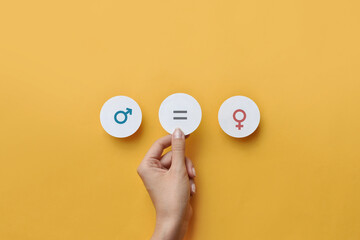 Paper circles with the icons men and women Equality between men and women. Gender equality and...