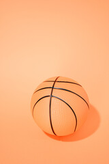 basketball on orange background. sport and competition.copy space. 3d illustration