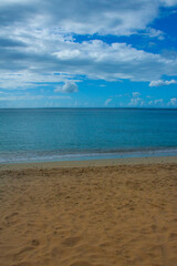 Fototapeta na wymiar colors of an exotic beach ,sky ,sea , sand
