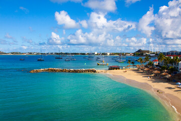 Fototapeta na wymiar exotic beach on the island caribbean sea , palm trees and yellow sand