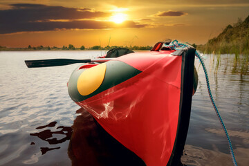 Kayaking on the Lake Concept Photo. Sport Kayak on the Rocky Lake Shore.fishing and hunting recreation
