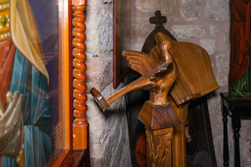 Obraz premium Carved wood decorative holders for holy books in the interior of the Sandanai Monastery in Christian quarters in the old city of Jerusalem, Israel