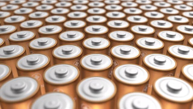 Tracking loopable shot of large pack of batteries with soft focus. 3D rendered macro pan of AA energy cells moving left.