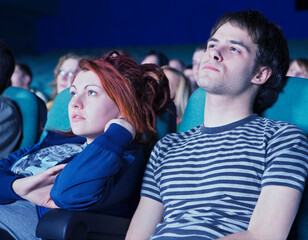 Man and woman in movie theater