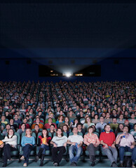 Naklejka premium Audience in movie theater
