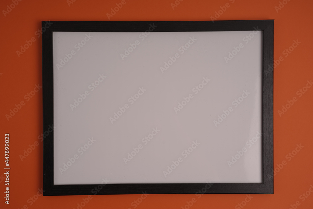 Poster black frame with empty white copy space for your content on a red background