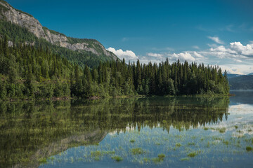 Fototapeta na wymiar Scenic Lake Reflections Norwegian Nordland County Saltfjellet–Svartisen National Park