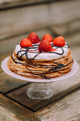 strawberry cake on wooden table