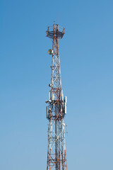 Communications tower with blue Cloud sky background