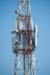 Communications tower with blue Cloud sky background
